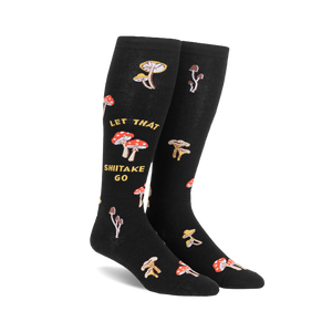 Pair of black knee-high socks with a whimsical design. Features various illustrated mushrooms and the text 'Let That Shiitake Go'.
