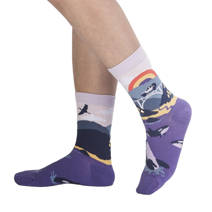 Lifestyle shot showing the Big Sur socks on a person's legs, showcasing the design and fit.