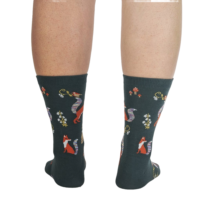 Back view of the socks on a person's legs, showcasing the full design repeat.
