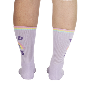 A pair of purple socks with the words 