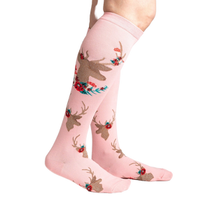 Lifestyle shot showcasing 'Fawn'd of You' knee-high socks on a model's legs, highlighting the sock's fit and pattern.