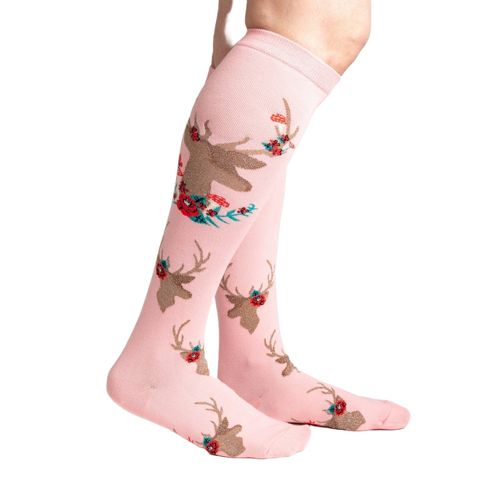 Lifestyle shot showcasing 'Fawn'd of You' knee-high socks on a model's legs, highlighting the sock's fit and pattern.