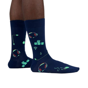 Lifestyle shot of the socks glowing in the dark, highlighting the luminescent design elements.