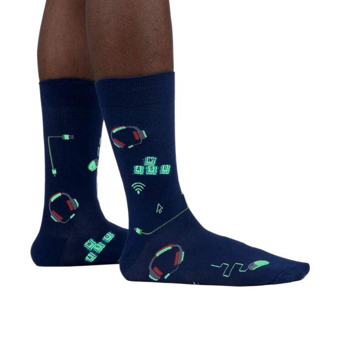 Lifestyle shot of the socks glowing in the dark, highlighting the luminescent design elements.
