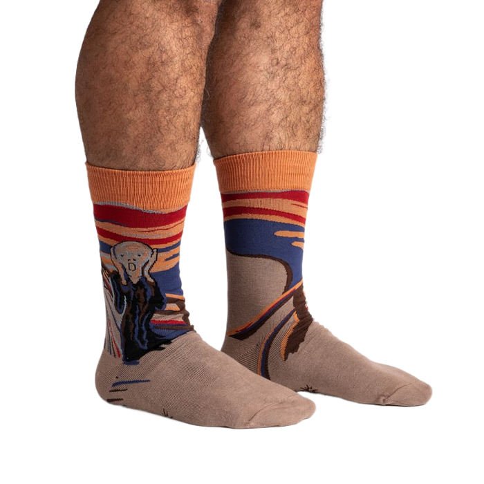 Lifestyle shot: The Sasquatch Scream socks on a model's legs, showcasing the full design and fit.