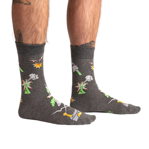 Lifestyle shot of a person wearing the Weird Science socks, showcasing the glow-in-the-dark feature.