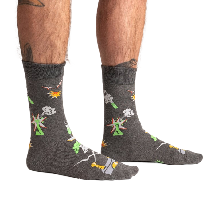 Lifestyle shot of a person wearing the Weird Science socks, showcasing the glow-in-the-dark feature.