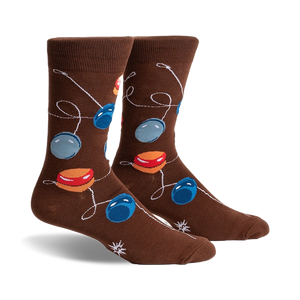 Brown crew socks with a playful design of colorful yo-yos on strings.