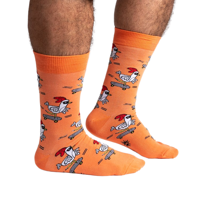 Lifestyle shot of Rad Chicken socks on a person's legs, showing the socks' length and fit.