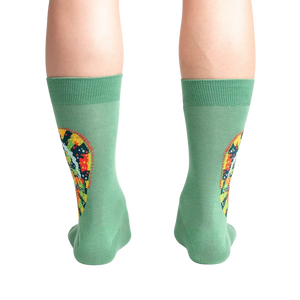 Rear view of a person wearing the socks, highlighting the full chameleon design on the back of the socks.