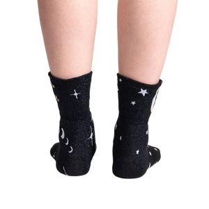 Back view of the socks showing the moon and star pattern.
