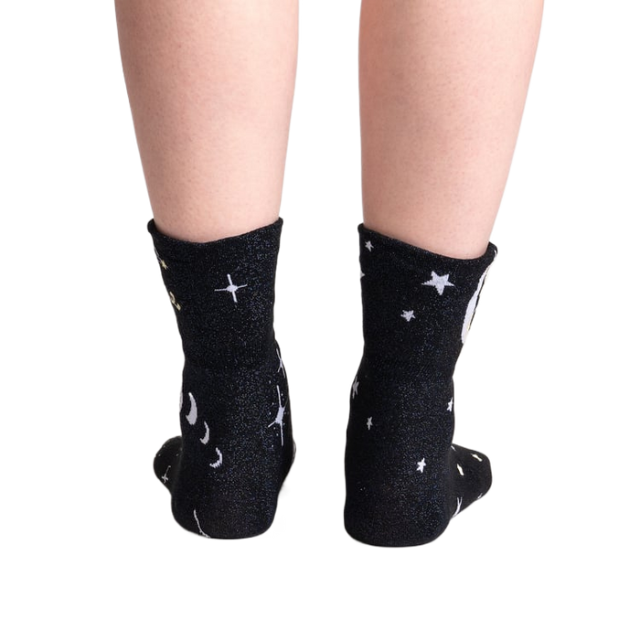Back view of the socks showing the moon and star pattern.
