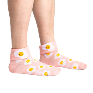 Lifestyle shot showing the socks on a person's legs, showcasing the fit and style.