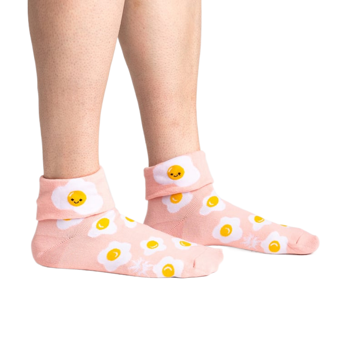 Lifestyle shot showing the socks on a person's legs, showcasing the fit and style.