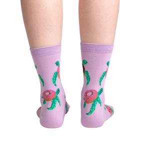 Back view of the same socks, showing the donut-turtle pattern.