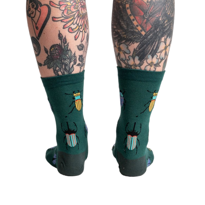 Back view of the socks highlighting the beetle pattern on the back of the leg.