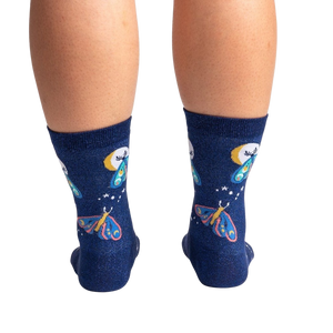 Back view of a pair of Moonlit Moth Shimmer socks on a person's legs, showing the back of the socks.