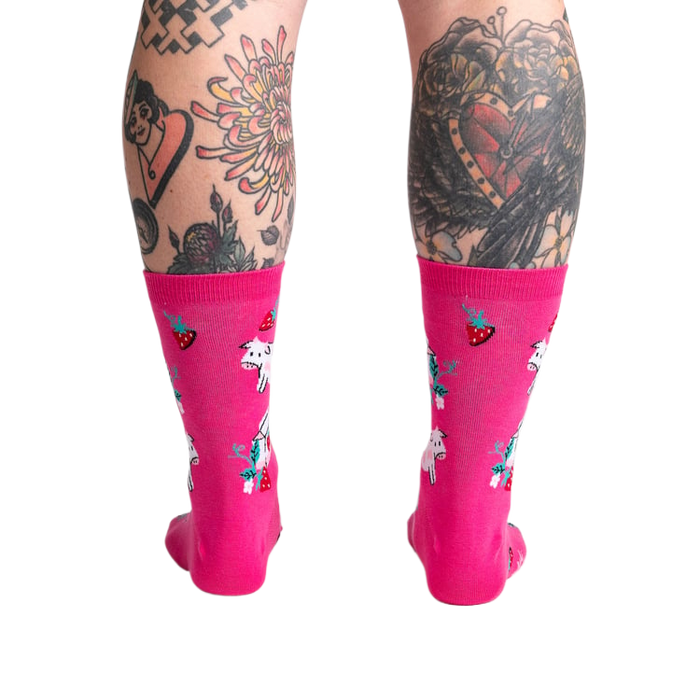 Back view of Strawberry Milk socks on a model, displaying the design on the back of the socks.