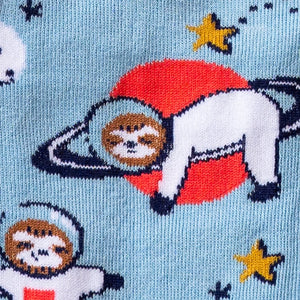 Close-up detail of the sock's fabric and print, showing the sloths and space elements.
