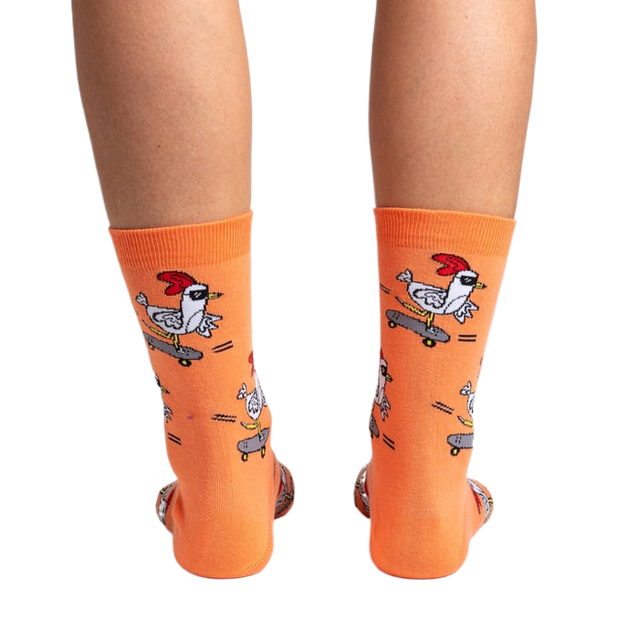 Back view of the Rad Chicken socks on a person's legs, highlighting the design from behind.
