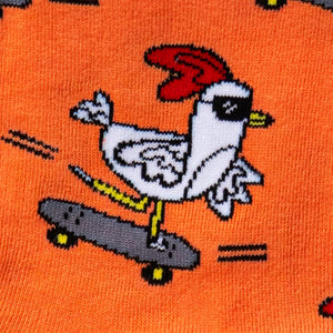 Close-up detail of the Rad Chicken design on the socks, showing the intricate details of the chicken and skateboard.