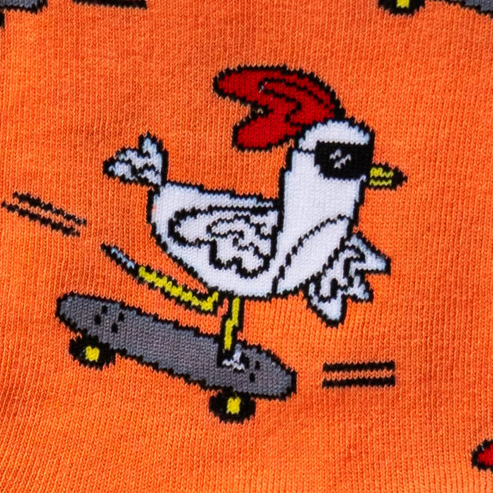 Close-up detail of the Rad Chicken design on the socks, showing the intricate details of the chicken and skateboard.