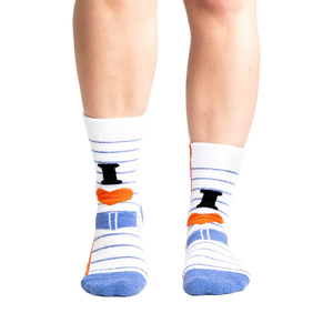 Lifestyle shot: Model wearing the 'I Love Books' socks. Shows how the socks look on feet.