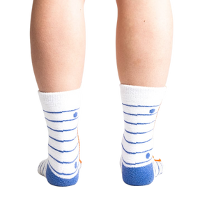 Back view of 'I Love Books' socks worn on model's feet, showing sock's back design and fit.