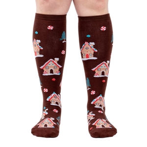 Front view of the socks on a person's legs, highlighting the full design.