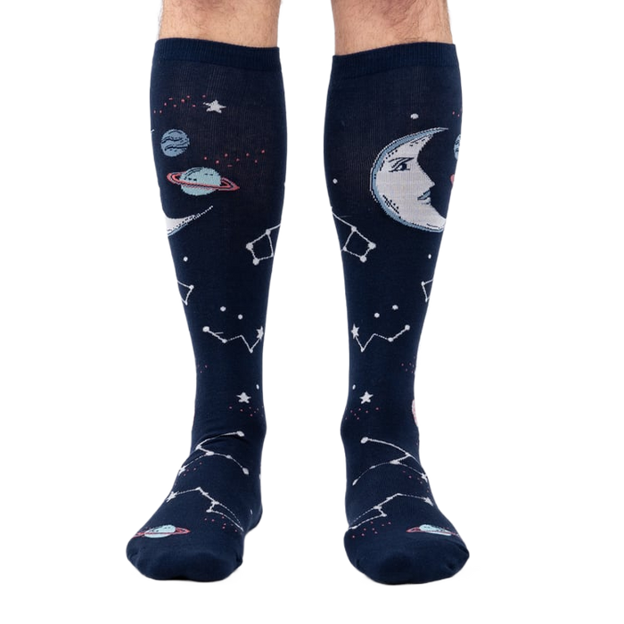 Front view of Moonshadow socks on a model's legs, highlighting the celestial print.
