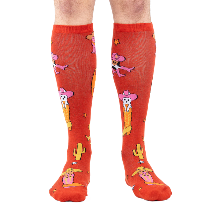 Front view of the 'Herding Cats' socks on a person's legs.