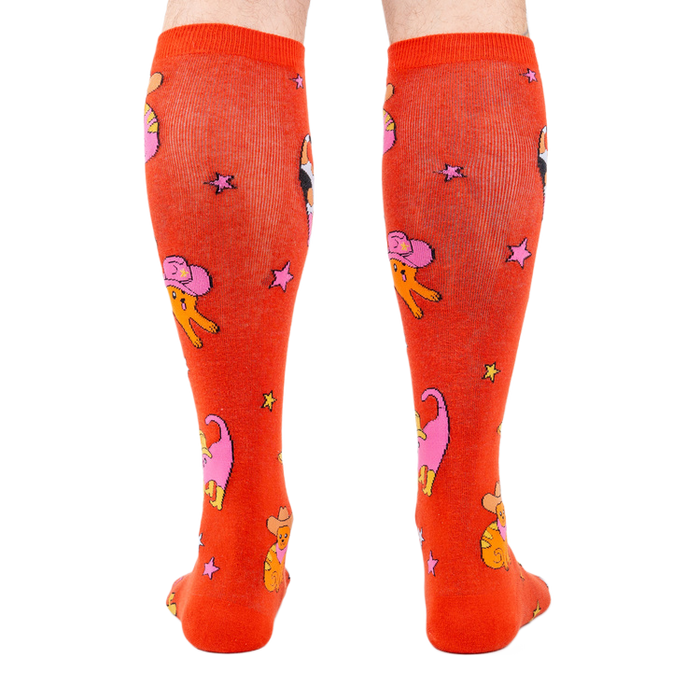 Back view of the 'Herding Cats' socks on a person's legs.