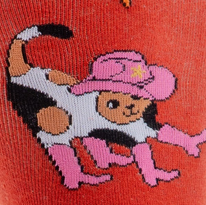 Close-up detail shot of the cat design on the 'Herding Cats' socks.