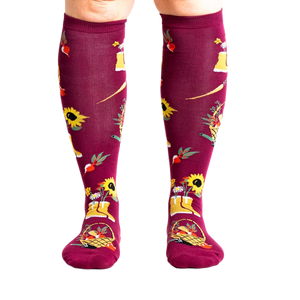 Lifestyle shot of model wearing Autumn Harvest knee-high socks.