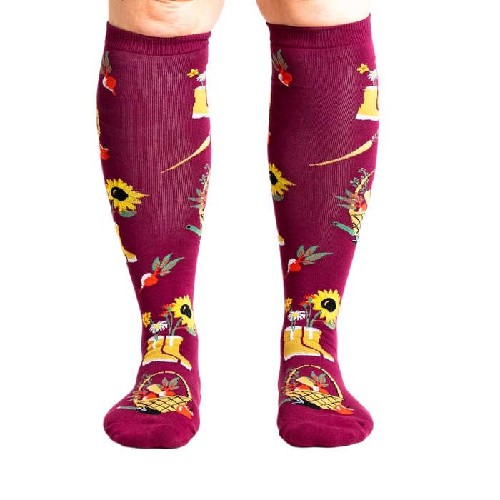 Lifestyle shot of model wearing Autumn Harvest knee-high socks.