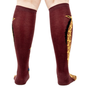 Back view of the socks, highlighting the giraffe design on both socks.