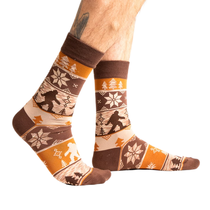 Lifestyle shot of Bigfoot socks on a person's feet, showcasing how they look when worn.