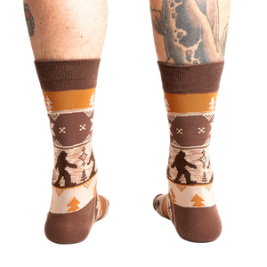 Rear view of the Bigfoot socks on a person's legs.