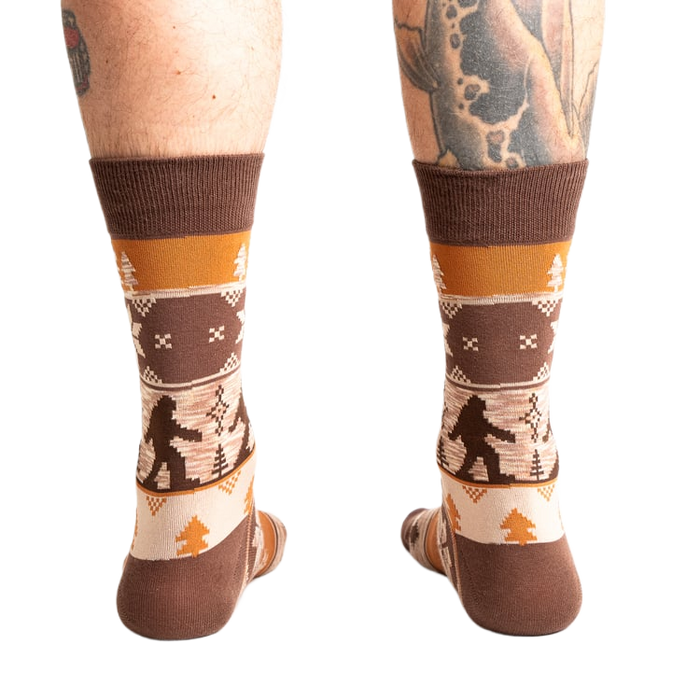 Rear view of the Bigfoot socks on a person's legs.