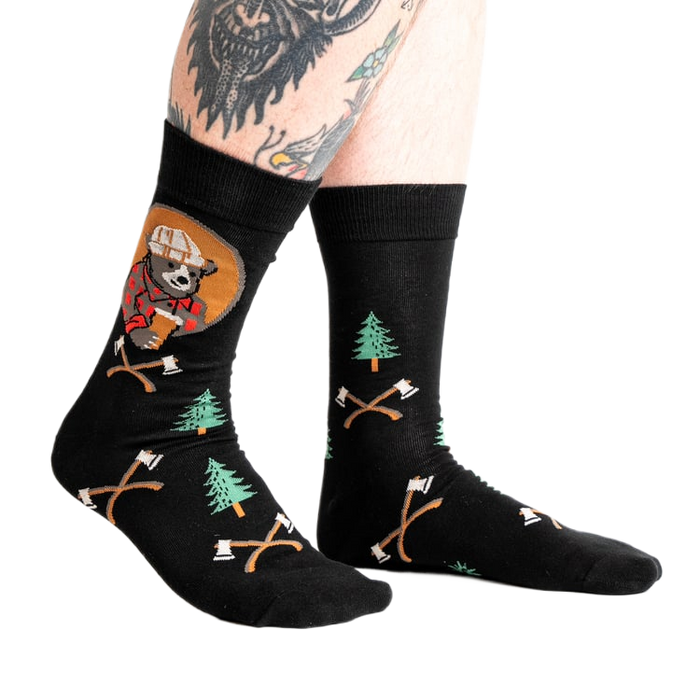 Lifestyle shot of Bear Necessities socks on a person's legs.