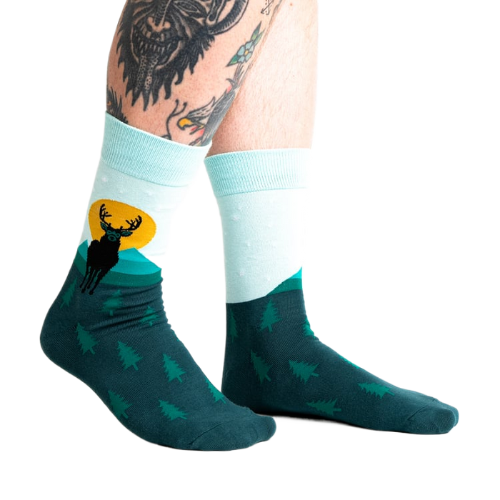 Lifestyle shot of a person wearing the Star Buck socks, showcasing the socks' design and fit.