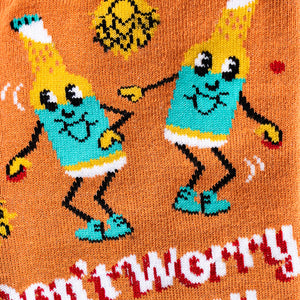 Close-up of the sock design highlighting the dancing beer bottle and hop details.