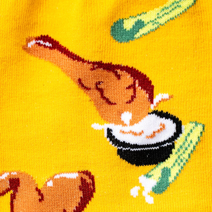 Close-up detail shot showcasing the fried chicken and sauce design on the yellow socks.