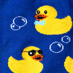 Close-up detail shot showcasing the intricate design of the yellow rubber duck and bubble print on the blue socks.