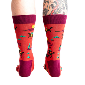 Rear view of the socks on a model, highlighting the sock's back design and heel.