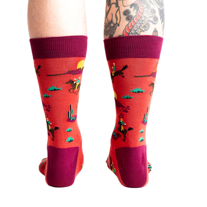 Rear view of the socks on a model, highlighting the sock's back design and heel.
