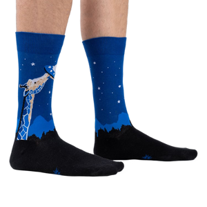 Lifestyle shot showing 'Stand Tall' socks on a person's legs.