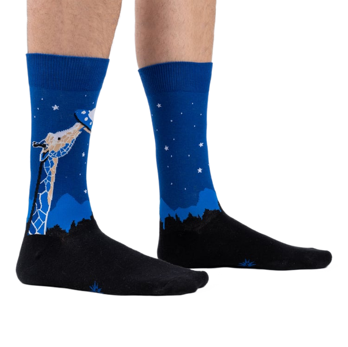 Lifestyle shot showing 'Stand Tall' socks on a person's legs.