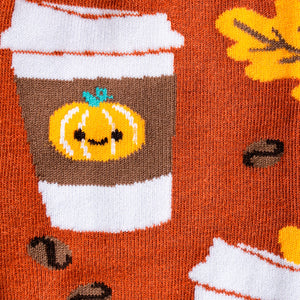 Close-up detail shot of the PSL socks' pattern, showcasing the cute pumpkin spice latte design.