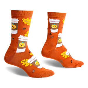 Pair of crew socks in burnt orange featuring a pattern of pumpkin spice latte cups, autumn leaves, and coffee beans.